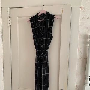 Assorted dresses and pants. 1 pair of Clark’s flats.